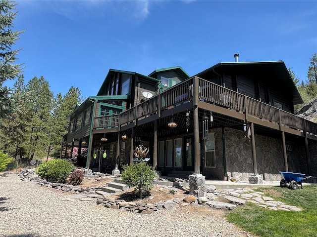 6961 Mt Highway 200, Plains, MT 59859 - back of house featuring a wooden deck