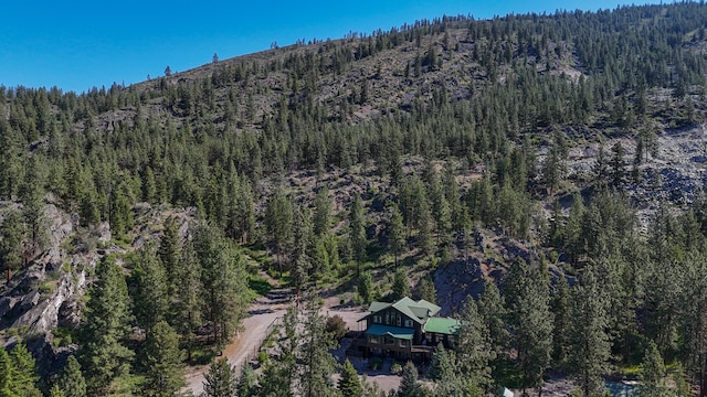 6961 Mt Highway 200, Plains, MT 59859 - aerial view of property's location with a forest and a mountainous background
