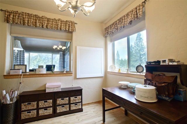 6961 Mt Highway 200, Plains, MT 59859 - home office with a chandelier, wood finished floors, and baseboards