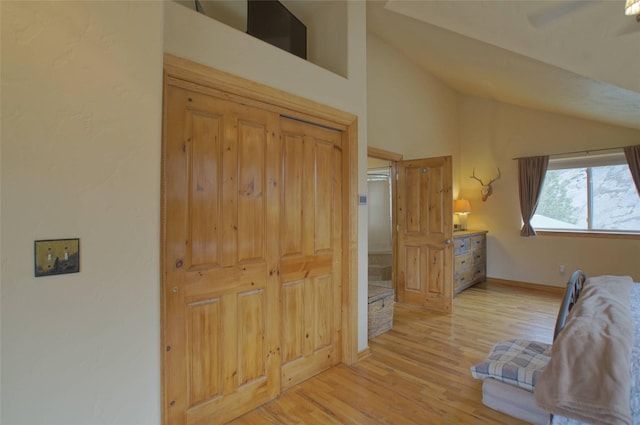 6961 Mt Highway 200, Plains, MT 59859 - bedroom with lofted ceiling, light wood finished floors, baseboards, and a ceiling fan