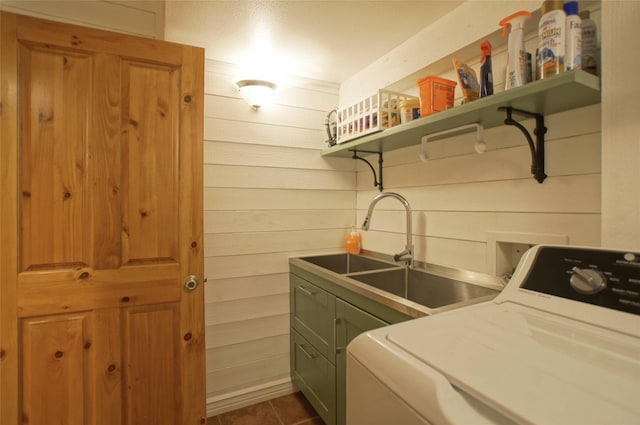 6961 Mt Highway 200, Plains, MT 59859 - laundry area featuring washer / clothes dryer, cabinet space, and wooden walls