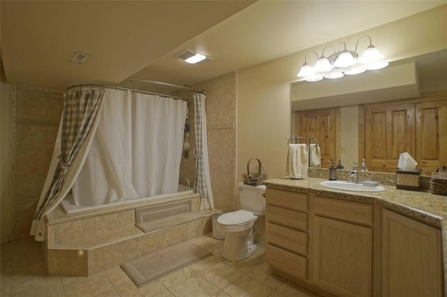 6961 Mt Highway 200, Plains, MT 59859 - bathroom with tiled shower / bath, tile patterned floors, vanity, and toilet