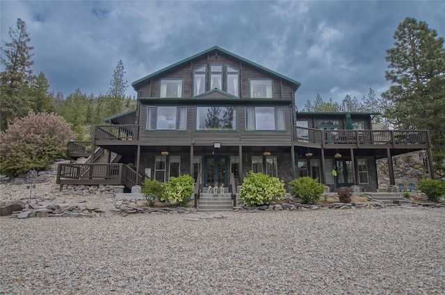6961 Mt Highway 200, Plains, MT 59859 - view of front of property with stairway and a deck