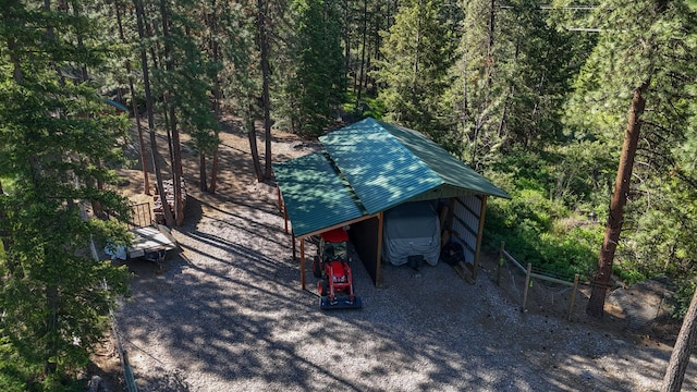 6961 Mt Highway 200, Plains, MT 59859 - garage featuring a forest view
