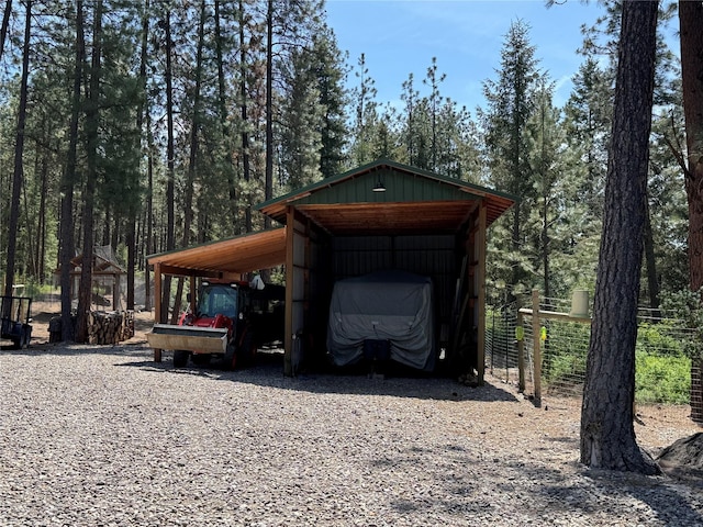 6961 Mt Highway 200, Plains, MT 59859 - view of outbuilding with a carport and gravel driveway
