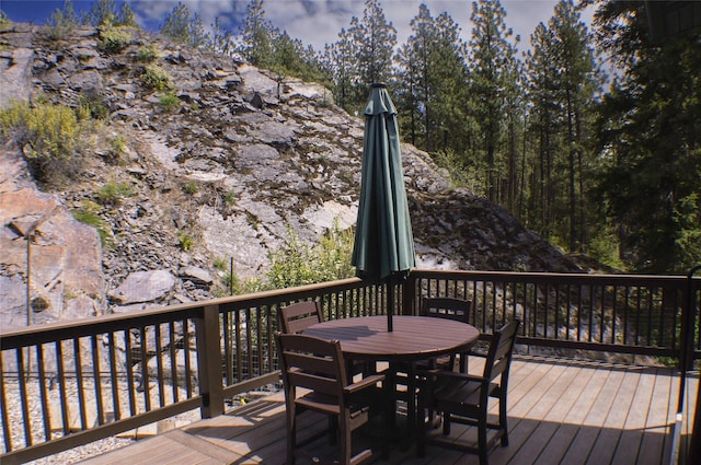 6961 Mt Highway 200, Plains, MT 59859 - wooden terrace with outdoor dining space