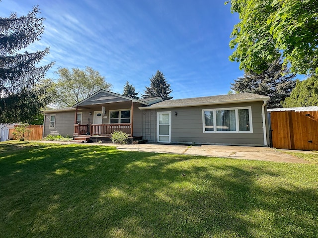 325 River Dr, Lolo, MT 59847 - rear view of property with a porch