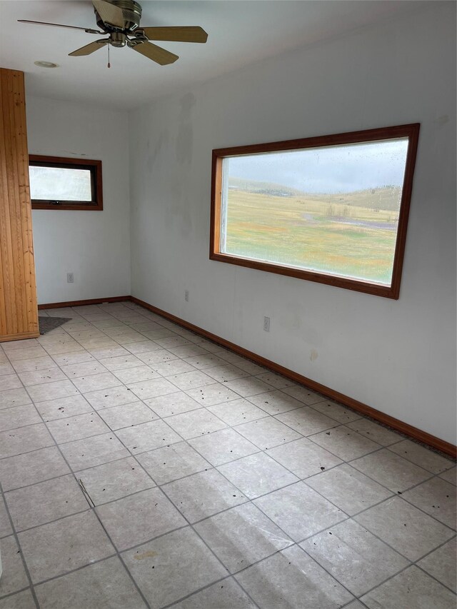 14 Sidehill Trl, Ennis, MT 59729 - spare room with baseboards and a ceiling fan