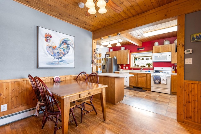 412 Mill St, Sheridan, MT 59749 - dining area with wood ceiling, beamed ceiling, wood walls, a baseboard heating unit, and wainscoting