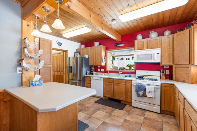 412 Mill St, Sheridan, MT 59749 - kitchen with white appliances, a sink, beamed ceiling, light countertops, and wood ceiling