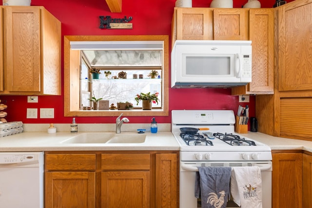 412 Mill St, Sheridan, MT 59749 - kitchen with white appliances, a sink, and light countertops