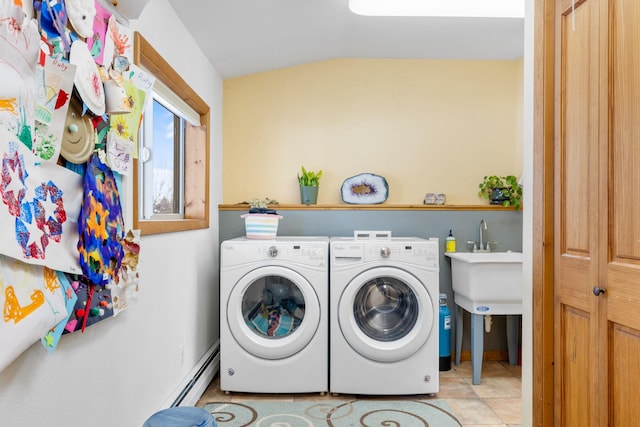 412 Mill St, Sheridan, MT 59749 - laundry room with a baseboard radiator, separate washer and dryer, and tile patterned flooring