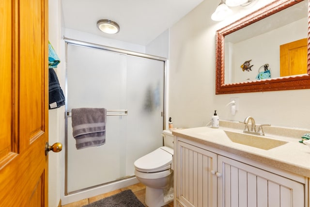 412 Mill St, Sheridan, MT 59749 - bathroom featuring a stall shower, toilet, vanity, and tile patterned flooring