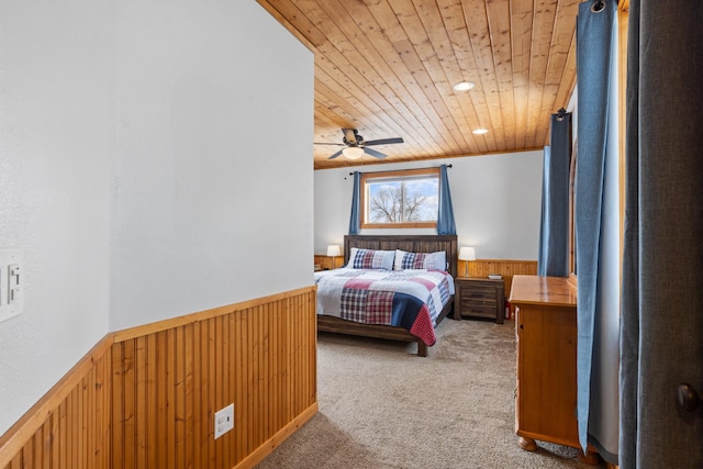 412 Mill St, Sheridan, MT 59749 - bedroom with wood ceiling, wainscoting, carpet floors, and wooden walls