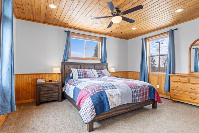 412 Mill St, Sheridan, MT 59749 - bedroom with a wainscoted wall, wood walls, light carpet, wood ceiling, and recessed lighting