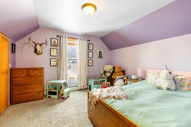 412 Mill St, Sheridan, MT 59749 - bedroom with vaulted ceiling, light carpet, and a baseboard heating unit