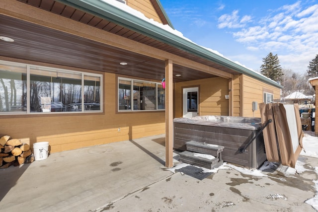 412 Mill St, Sheridan, MT 59749 - view of patio / terrace with a hot tub