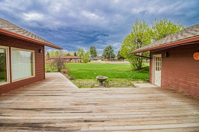 6 Cedar Lake Dr, Butte, MT 59701 - wooden terrace with a yard