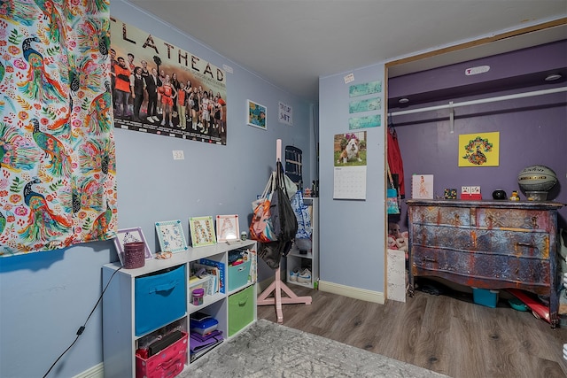 1030 1st Ave W, Kalispell, MT 59901 - rec room with wood finished floors and baseboards