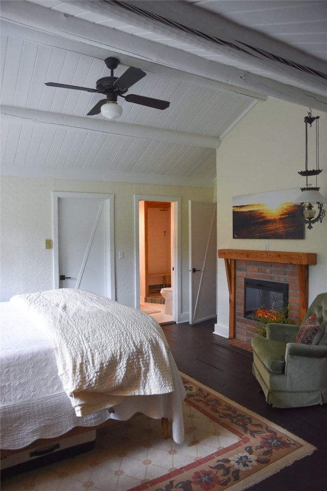 bedroom featuring a fireplace and ensuite bath