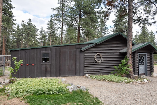 view of outbuilding featuring driveway