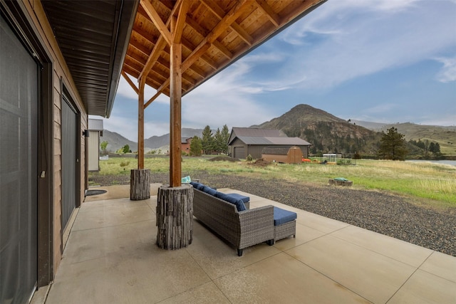 view of patio with a mountain view