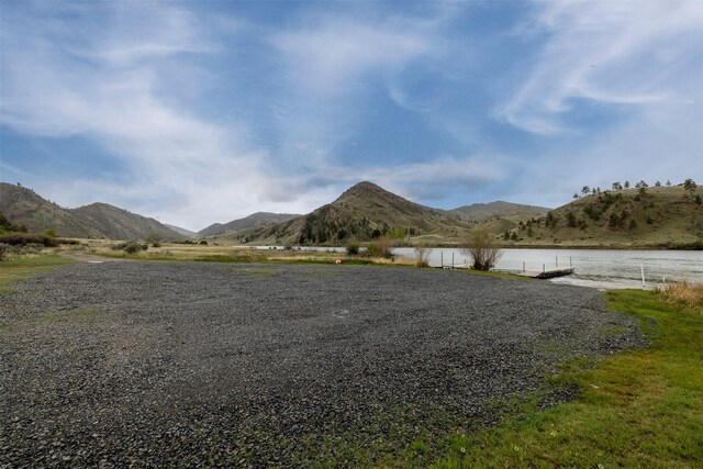 mountain view featuring a nearby body of water