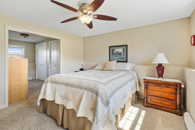 3768 Beechnut St, East Helena, MT 59635 - bedroom with light colored carpet, a closet, ceiling fan, baseboards, and baseboard heating