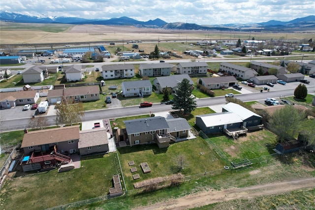 3768 Beechnut St, East Helena, MT 59635 - aerial perspective of suburban area featuring a mountain backdrop