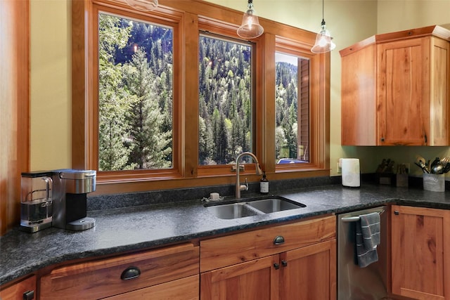 318 Mt Highway 56, Noxon, MT 59853 - kitchen featuring a sink, hanging light fixtures, brown cabinets, and stainless steel dishwasher