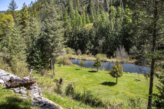 318 Mt Highway 56, Noxon, MT 59853 - water view with a heavily wooded area