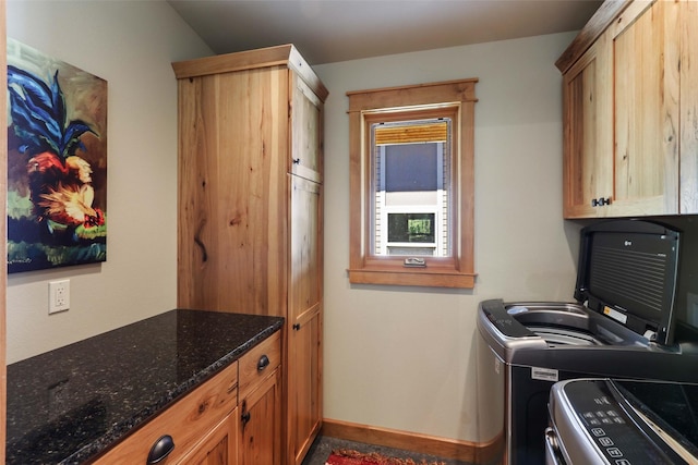 318 Mt Highway 56, Noxon, MT 59853 - washroom featuring cabinet space, washer and clothes dryer, and baseboards