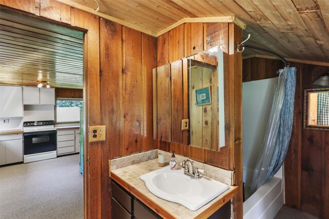 318 Mt Highway 56, Noxon, MT 59853 - full bathroom featuring wood ceiling, wooden walls, vanity, shower / bath combo with shower curtain, and lofted ceiling