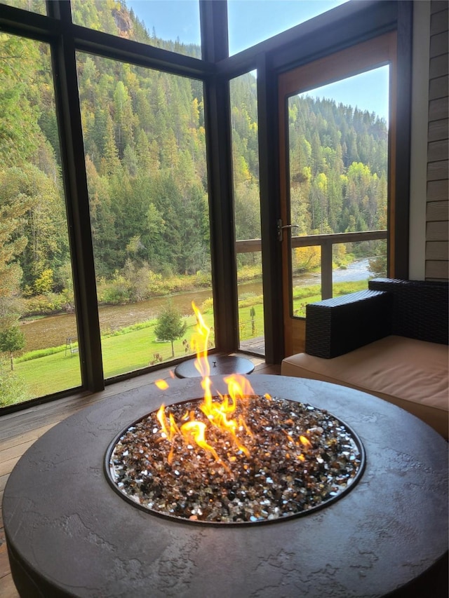 318 Mt Highway 56, Noxon, MT 59853 - detailed view of a fire pit and a wooded view