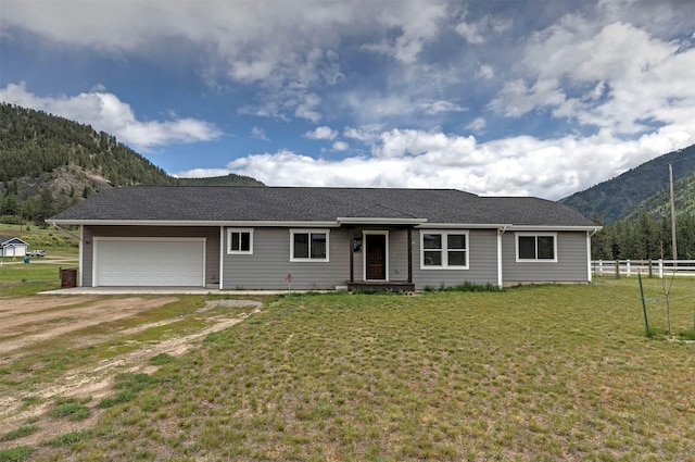 301 Bernie Rd, Alberton, MT 59820 - single story home featuring a mountain view, an attached garage, and driveway