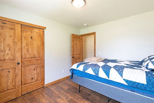 301 Bernie Rd, Alberton, MT 59820 - bedroom with dark wood-style floors and baseboards
