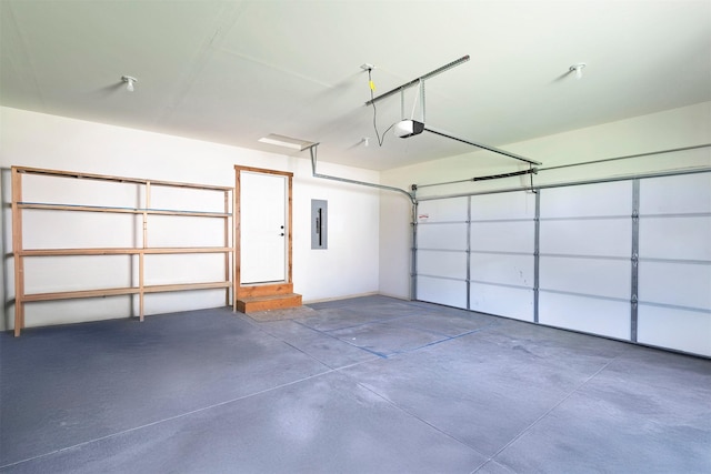 301 Bernie Rd, Alberton, MT 59820 - garage featuring a garage door opener and electric panel