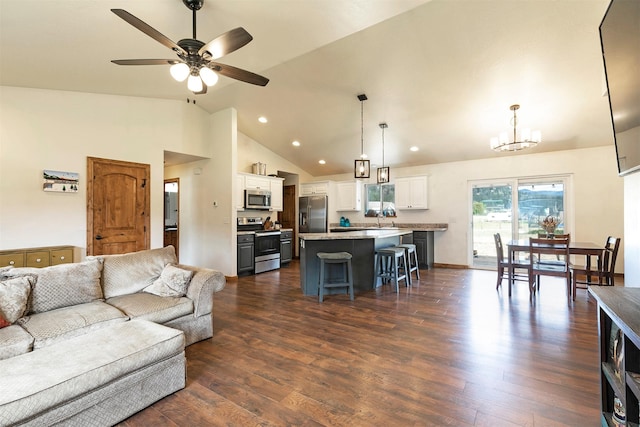 301 Bernie Rd, Alberton, MT 59820 - living area featuring ceiling fan, dark wood-style floors, a chandelier, high vaulted ceiling, and recessed lighting
