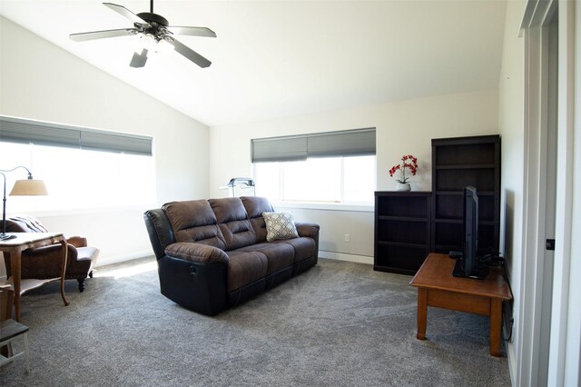 4714 Linhart Ln, Stevensville, MT 59870 - carpeted living area featuring lofted ceiling, ceiling fan, and baseboards