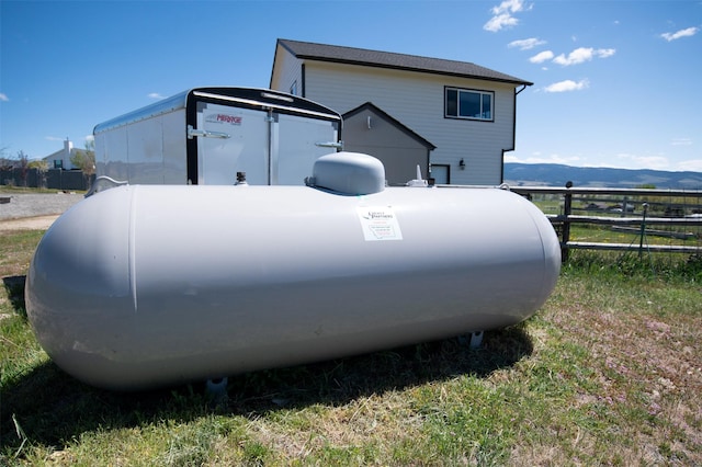4714 Linhart Ln, Stevensville, MT 59870 - exterior view of fence and propane tank