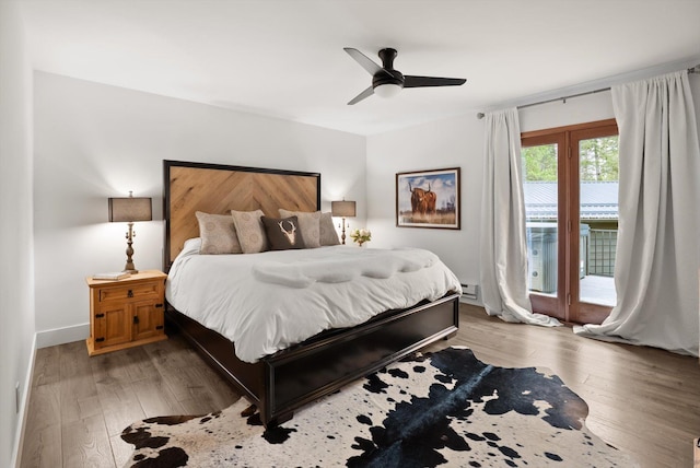 135 Sapphire Ct, Whitefish, MT 59937 - bedroom featuring access to outside, light wood-style flooring, and a ceiling fan