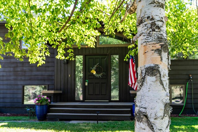 135 Sapphire Ct, Whitefish, MT 59937 - property entrance featuring board and batten siding