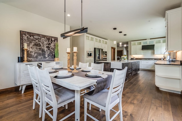dining room featuring dark wood-style flooring and recessed lighting