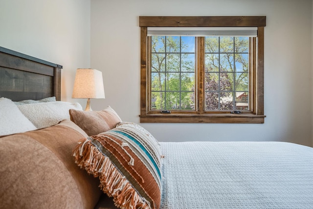 bedroom featuring a fireplace