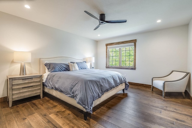 bedroom featuring dark wood-type flooring, baseboards, recessed lighting, and a ceiling fan