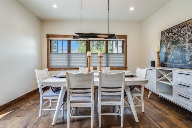 dining area featuring dark wood-type flooring, recessed lighting, and baseboards