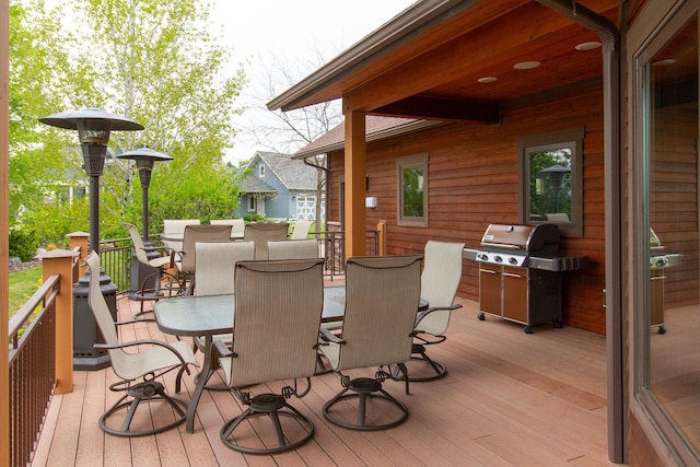 34520 Rocky Point Rd, Polson, MT 59860 - wooden deck featuring outdoor dining area and a grill