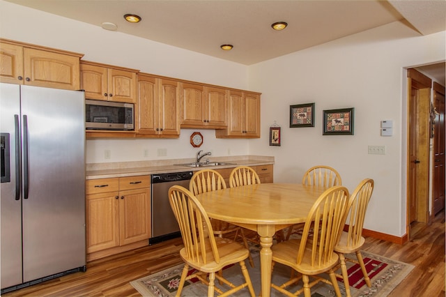34520 Rocky Point Rd, Polson, MT 59860 - dining area featuring wood finished floors and recessed lighting