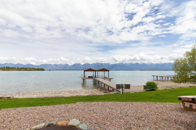 34520 Rocky Point Rd, Polson, MT 59860 - dock featuring a water and mountain view