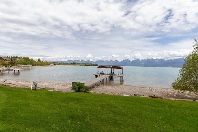 34520 Rocky Point Rd, Polson, MT 59860 - dock featuring a water and mountain view and a yard